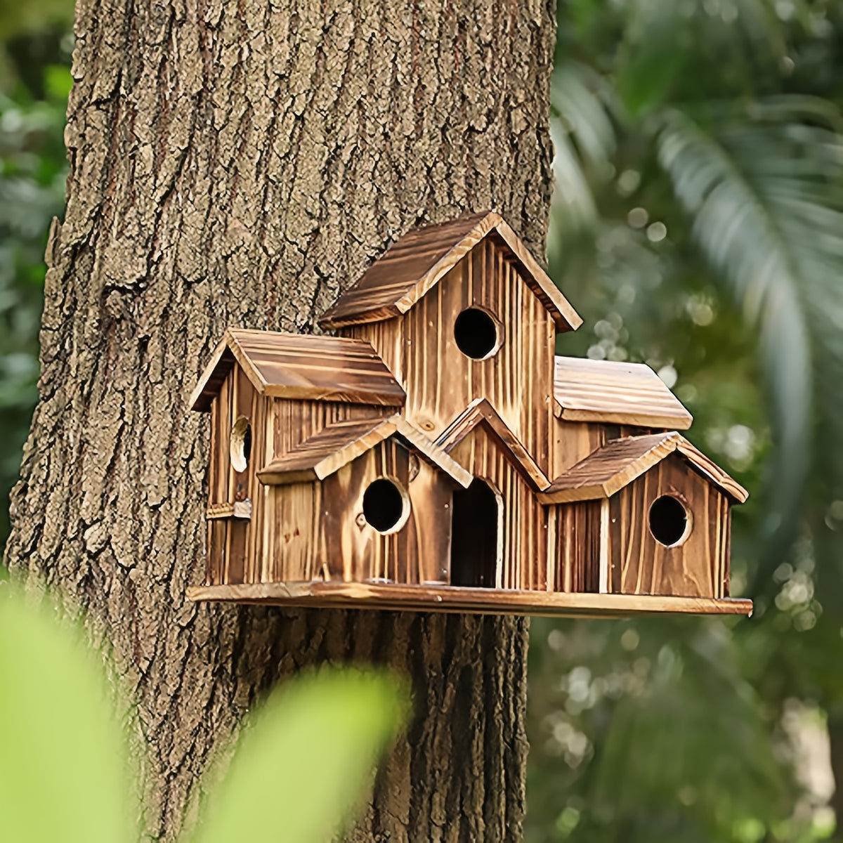 Rustic Outdoor Birdhouse in Dark Brown, Wooden Country Cottage Design with Multiple Entry Openings and Pitched Roofs for Garden and Yard Decor